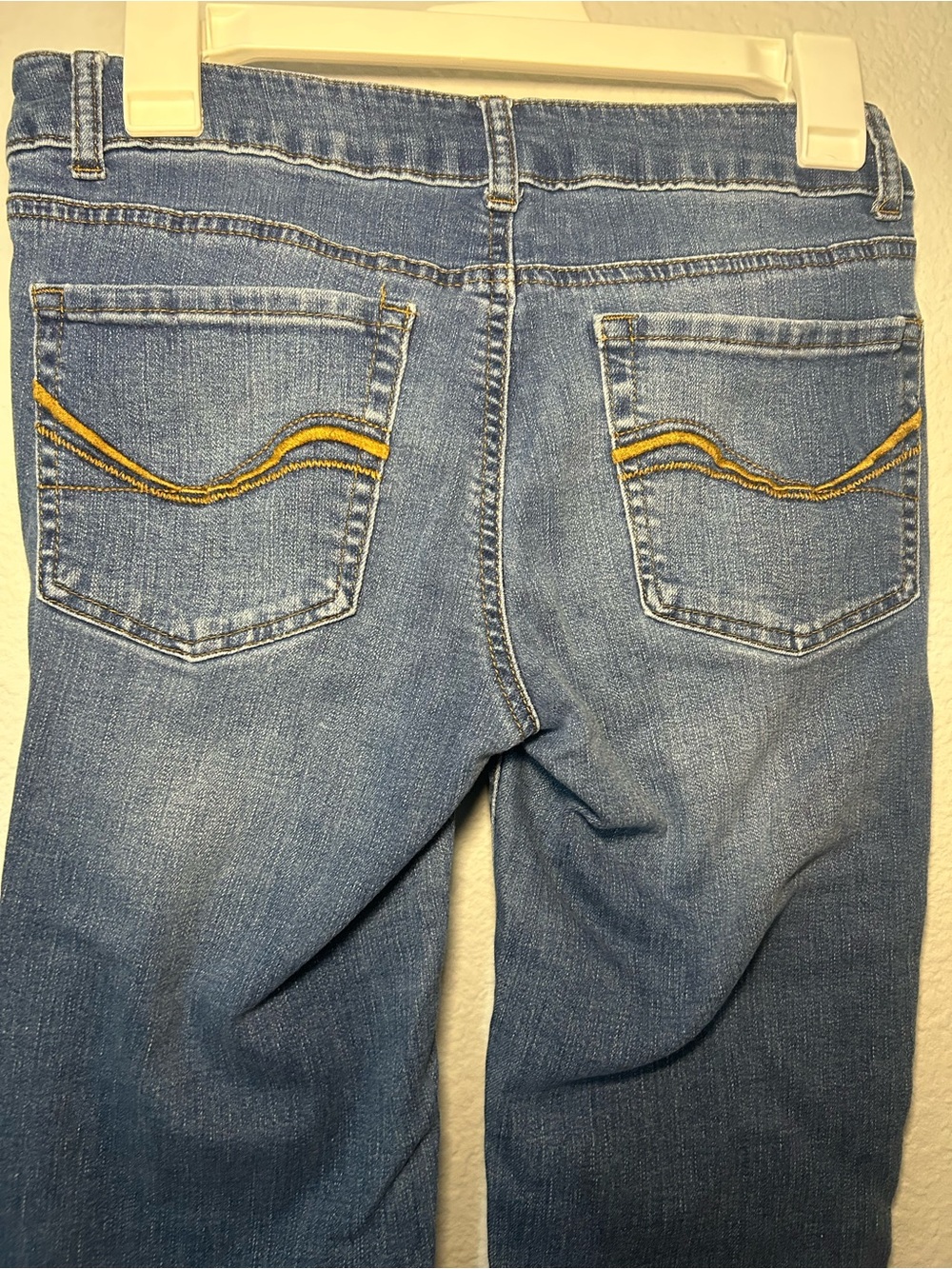 Blue Denim Jeans with Yellow Pocket Stitching